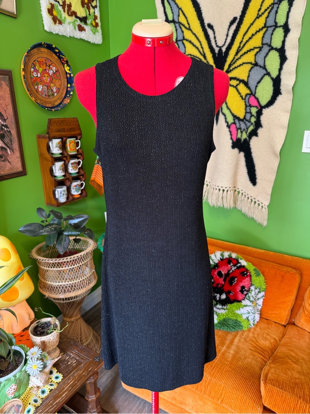 Jump Black Sleeveless Mini Dress with Subtle Shimmer